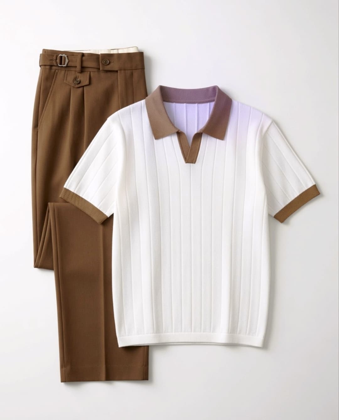 Ivory ribbed camp polo laid with a pleated wool trouser